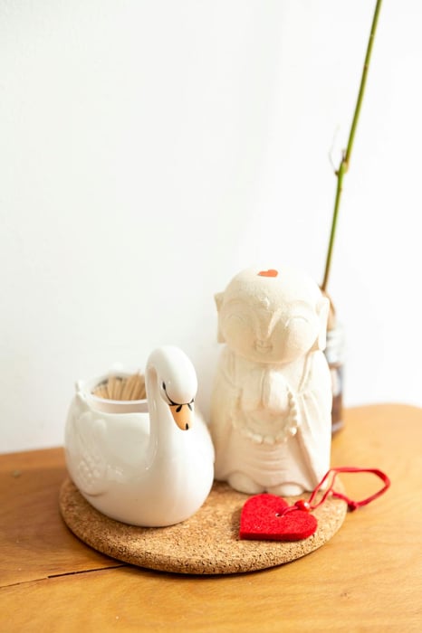 Swan and Buddha Figurines